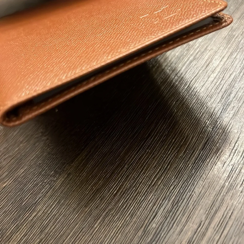 Authentic Louis Vuitton brown taiga leather bifold card I.D. Holder